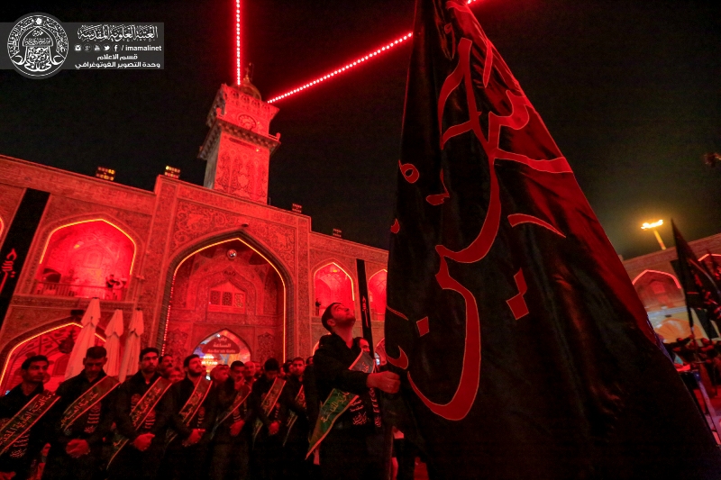 گزارش تصویری از برگزاری مراسم اهتزاز پرچم امام حسین در حرم مطهر امام علی (ع)