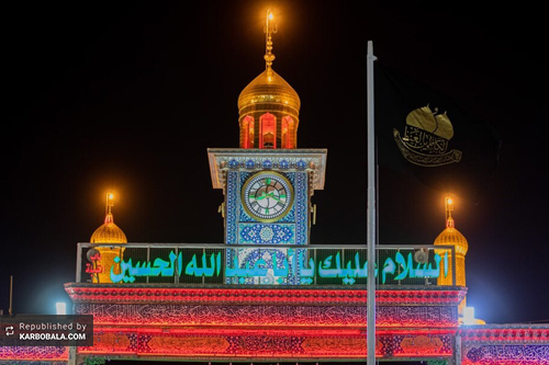 پرچم امامین الجوادین بر فراز باب القبله آستان حسینی برافراشته شد / گزارش تصویری