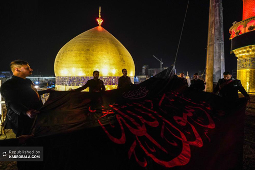 اهتزاز پرچم عزای پیامبر خاتم بر فراز ایوان نجف
